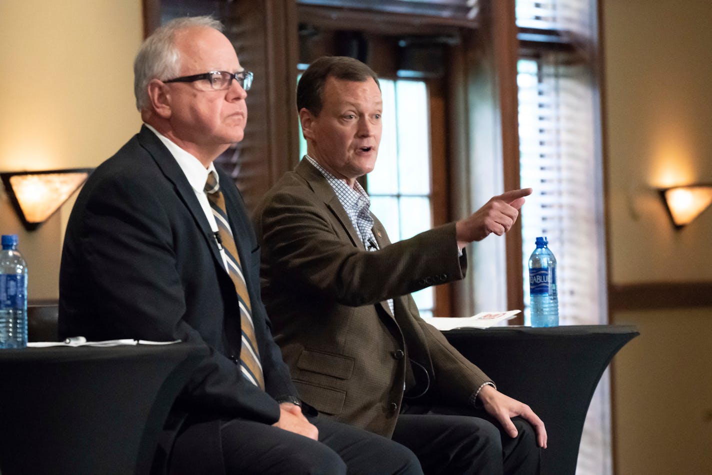 Candidates for Minnesota governor Tim Walz, Democrat, left and Jeff Johnson, Republican during their first debate on Aug. 17.