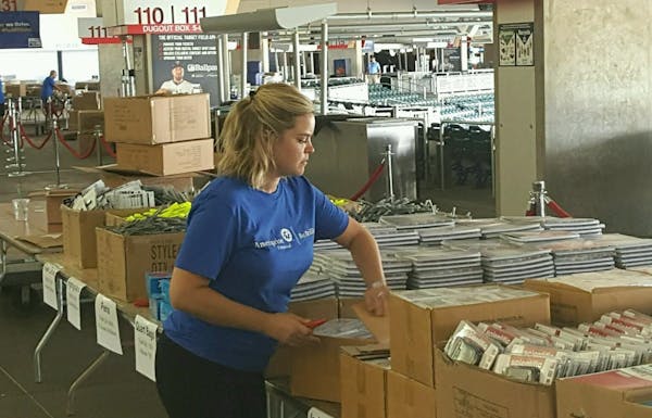Volunteer Megan Yoshida organized school supplies for the the Greater Twin Cities United Way's 6th Annual Action Day on Aug. 18, 2016.