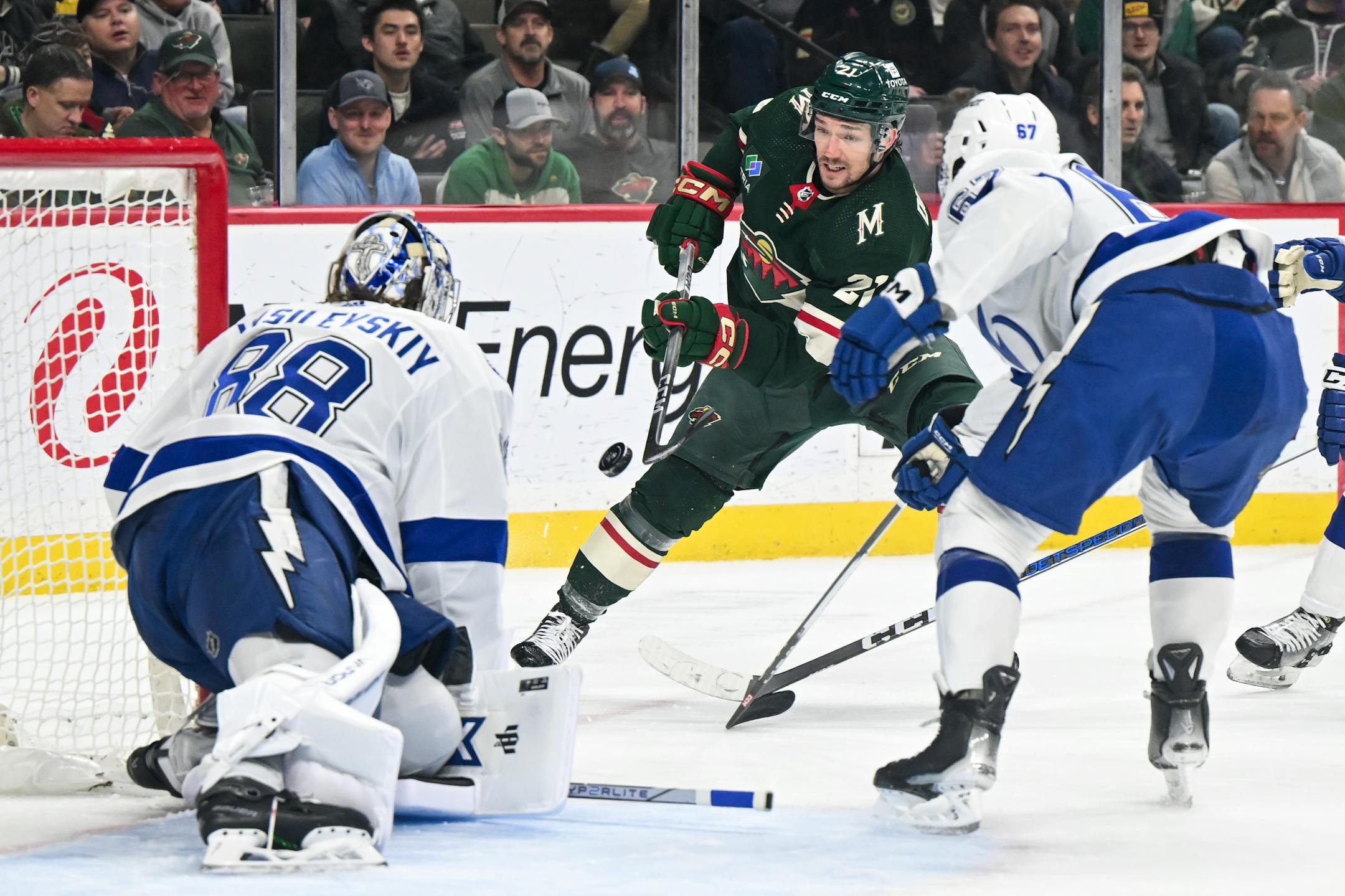Minnesota Wild right wing Brandon Duhaime (21) attetmps a shot against Tampa Bay Lightning goaltender Andrei Vasilevskiy (88) during the first period Thursday, Jan. 4, 2024 at Xcel Energy Center in St. Paul, Minn.. ] AARON LAVINSKY • aaron.lavinsky@startribune.com