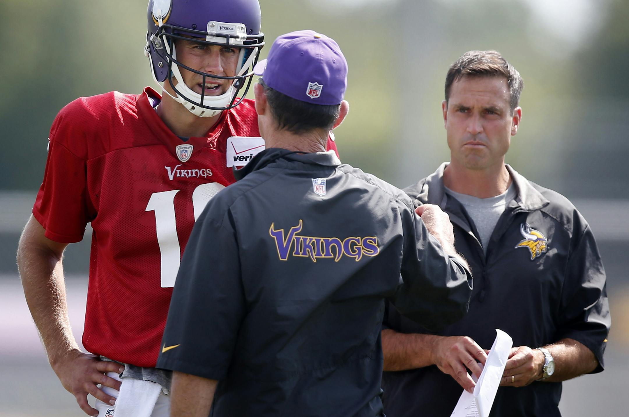 Minnesota Vikings head coach Mike Zimmer spoke with quarterback Matt Cassel. Special teams coach Mike Priefer pictured on right during practice on Wednesday. ] CARLOS GONZALEZ cgonzalez@startribune.com - August 13, 2014 , Mankato, Minn., Minnesota State University, Mankato, Minnesota Vikings Training Camp, NFL,