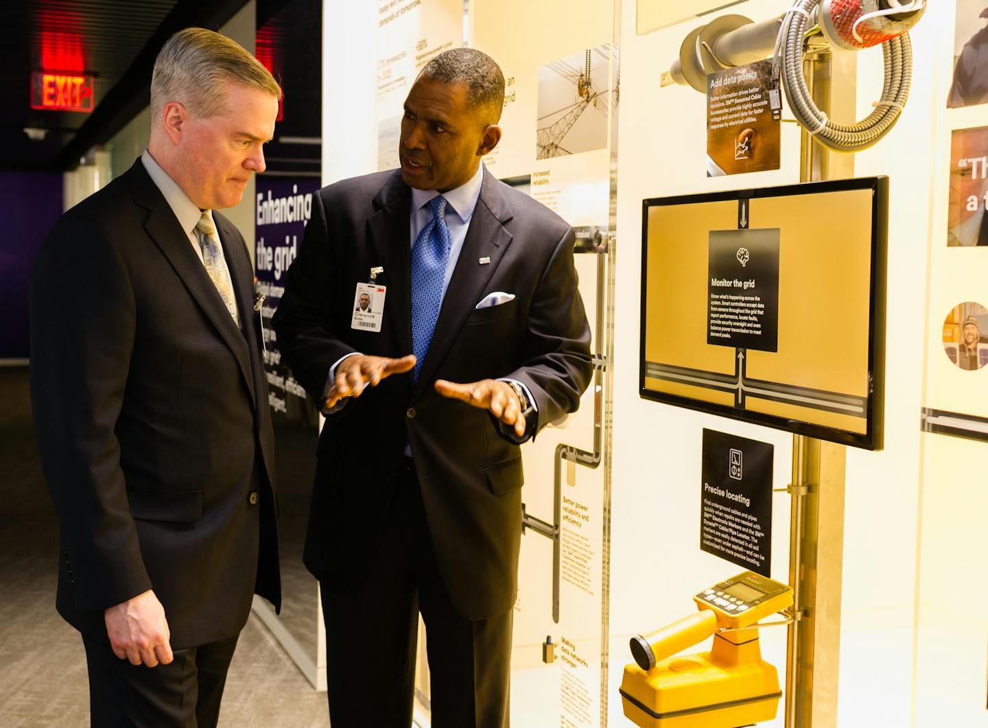 Kevin Rhodes (left), 3M's vice president and chief intellectual property counsel, and Clarence Butts, sales account representative for the Electrical Markets Division, attend the Feb. 27 opening of 3M's Washington, D.C., innovation center. (Rodney Choice/Choice Photography)