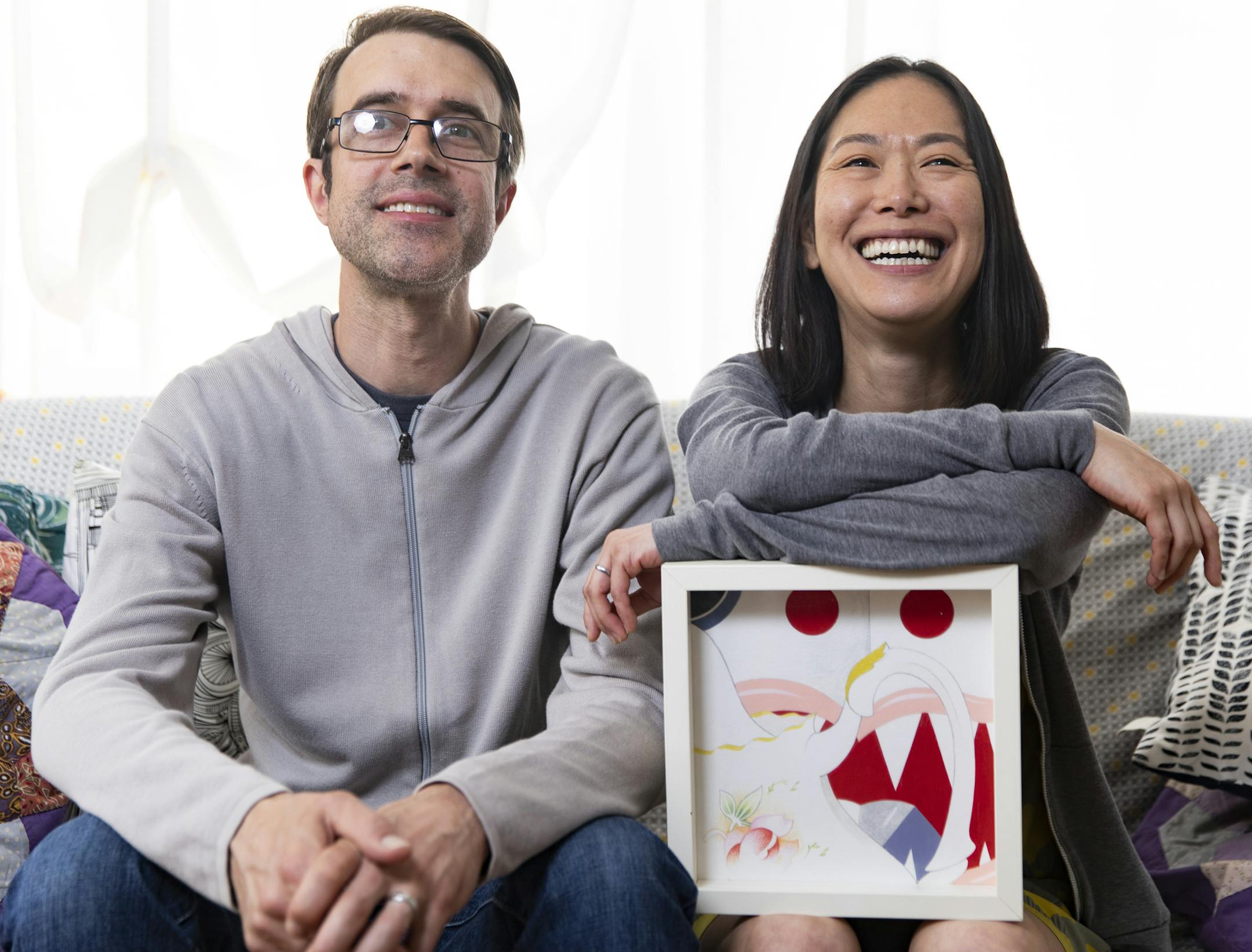 Aaron Merrill and Masami Kawazato seek out work by local artists, such as "Untitled" by Andrea Carlson, for their condo in Uptown.