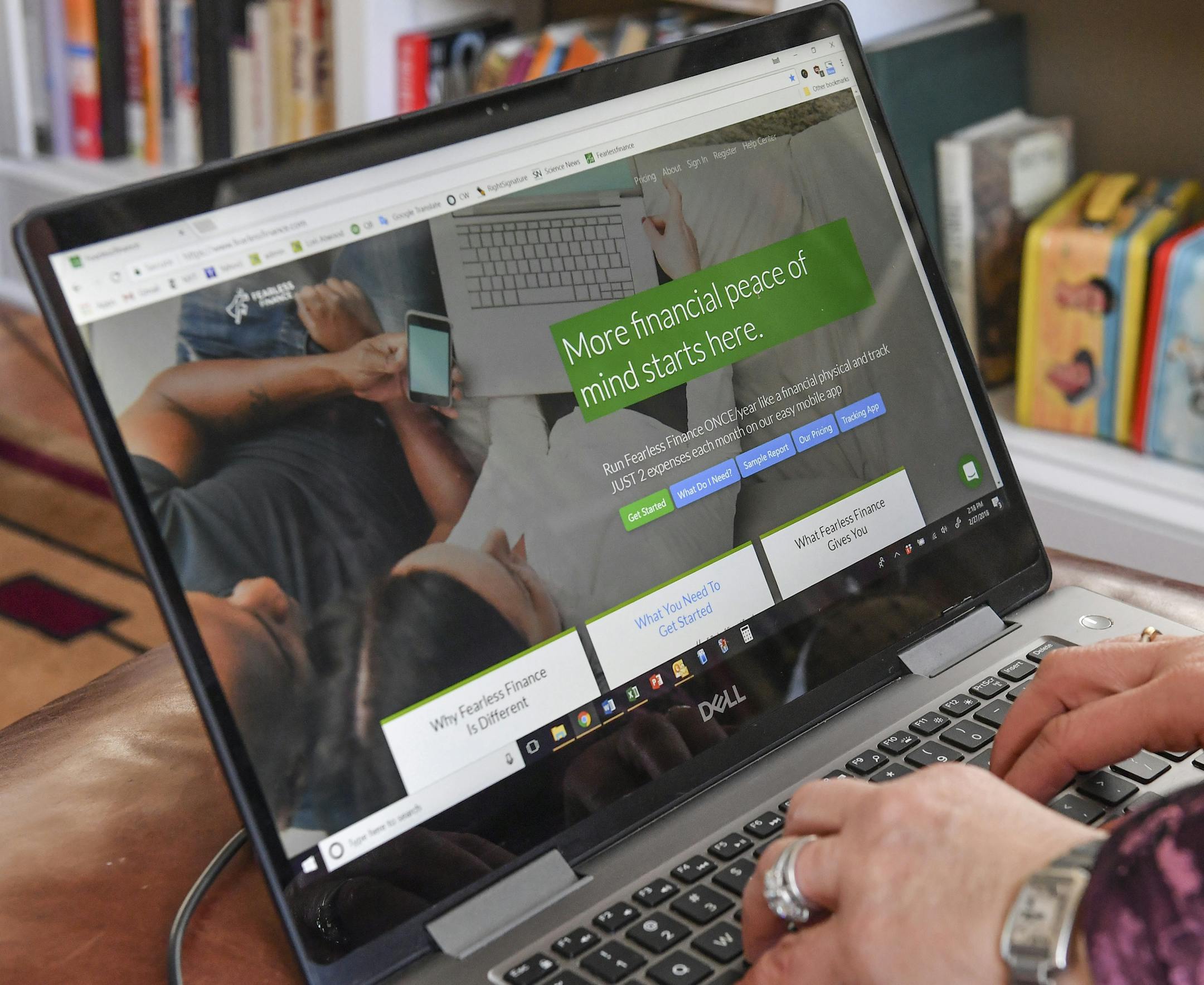 Lori Atwood, founder of Fearless Finance financial software, shows the start-up page of her creation at her home office. MUST CREDIT: Washington Post photo by Ricky Carioti ORG XMIT: 245335