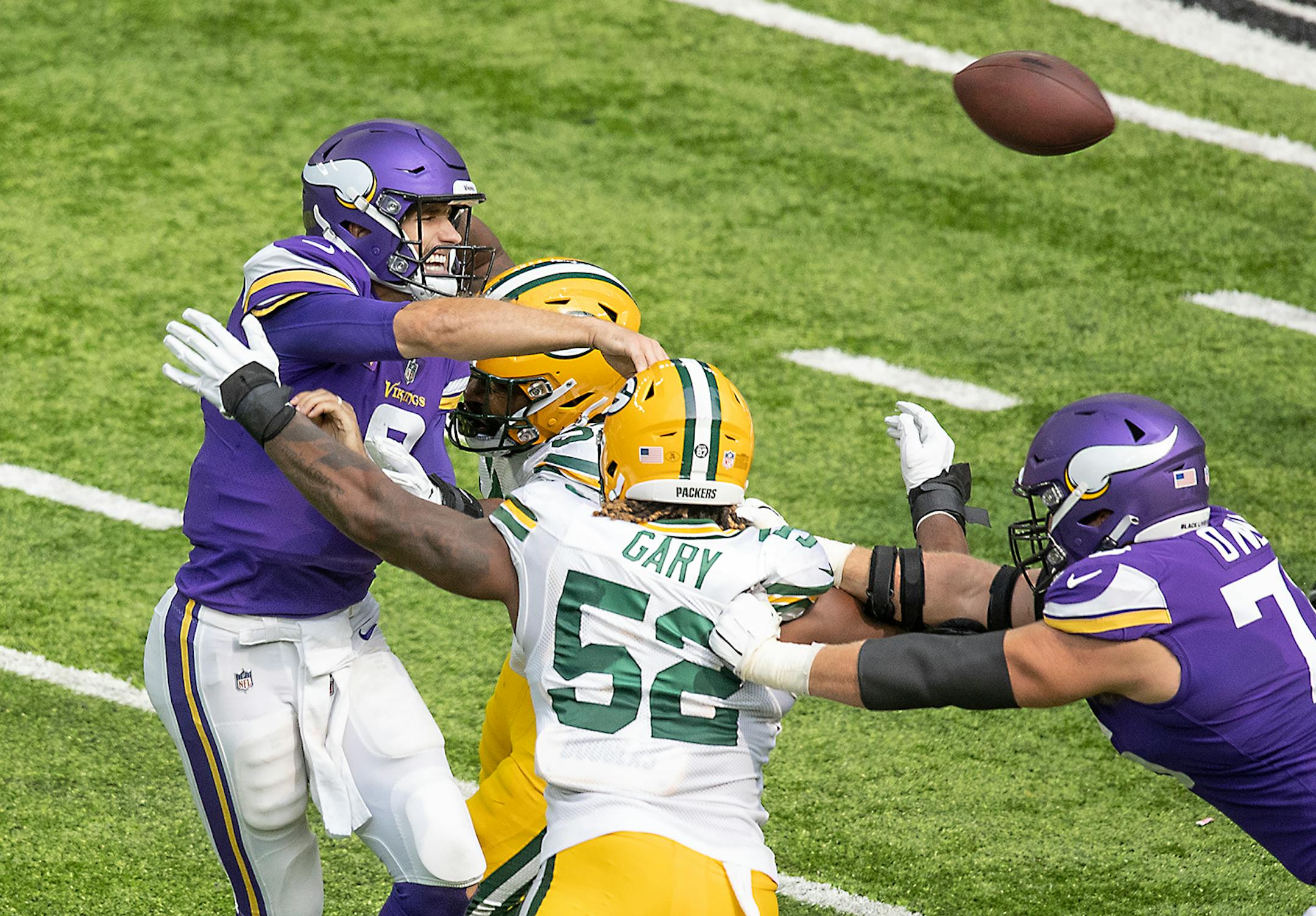 Minnesota Vikings quarterback Kirk Cousins endured the Green Bay defense during the fourth quarter.