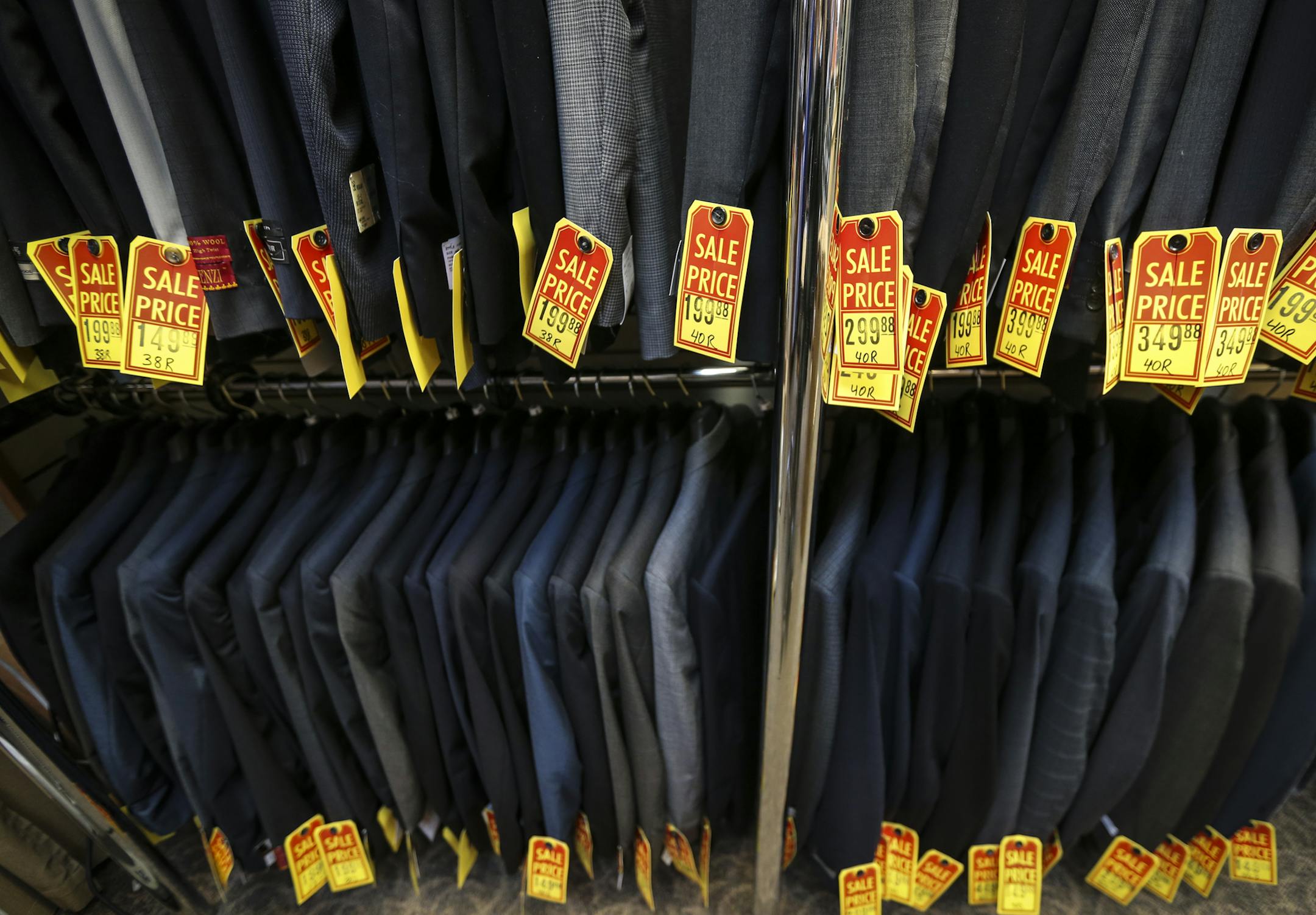 A special sale is going on in on of Bill Wermerskirchen's retirement at Bill's Toggery in Shakopee, Minn., on Tuesday, November 25, 2014. Wermerskirchen is the son of the original owner of Bill's Toggery, also named Bill Wermerskirchen, and when he retires his son Billy will continue the business. ] RENEE JONES SCHNEIDER • reneejones@startribune.com