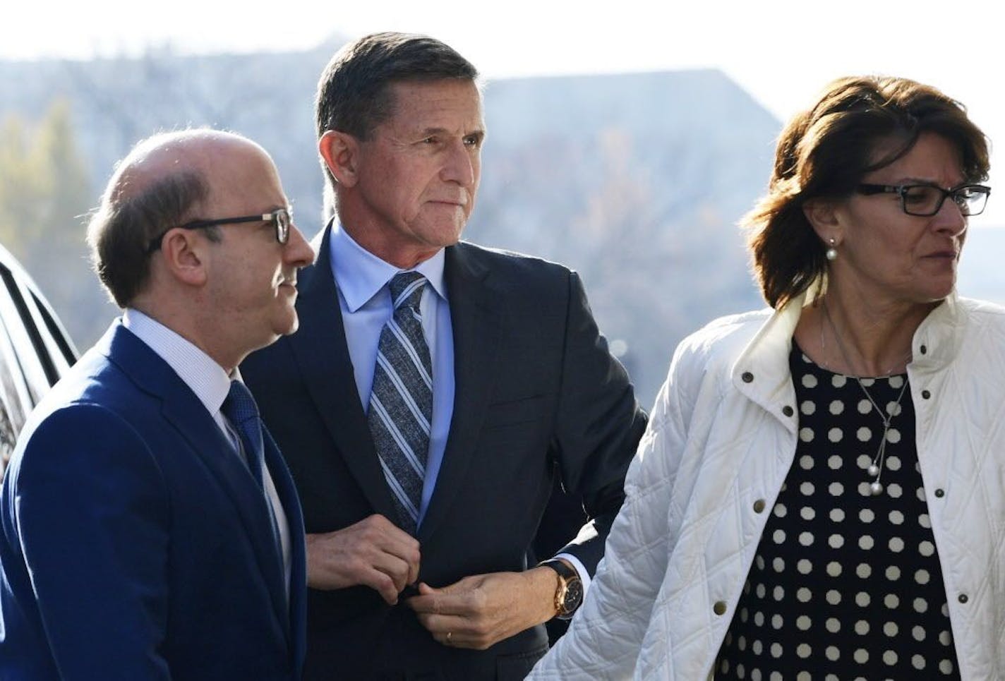 Former Trump national security adviser Michael Flynn arrives at federal court in Washington, Friday, Dec. 1, 2017. Flynn is to plead guilty Friday to making false statements to the FBI, the first plea by any of the four former Trump advisers charged so far in a wide-ranging investigation led by special counsel Robert Mueller.