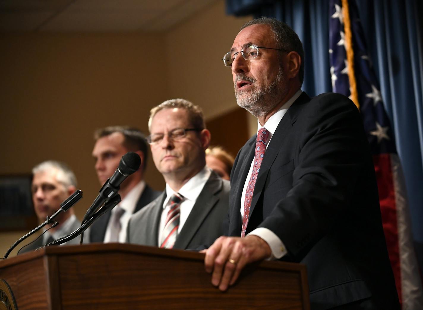 U.S. Attorney Andy Luger spoke to reporters following convictions of Abdirahman Daud, 22; Mohamed Farah, 22; and Guled Omar, 21, for conspiracy to commit murder abroad. The three were guilty on all counts except for a perjury count against Daud.