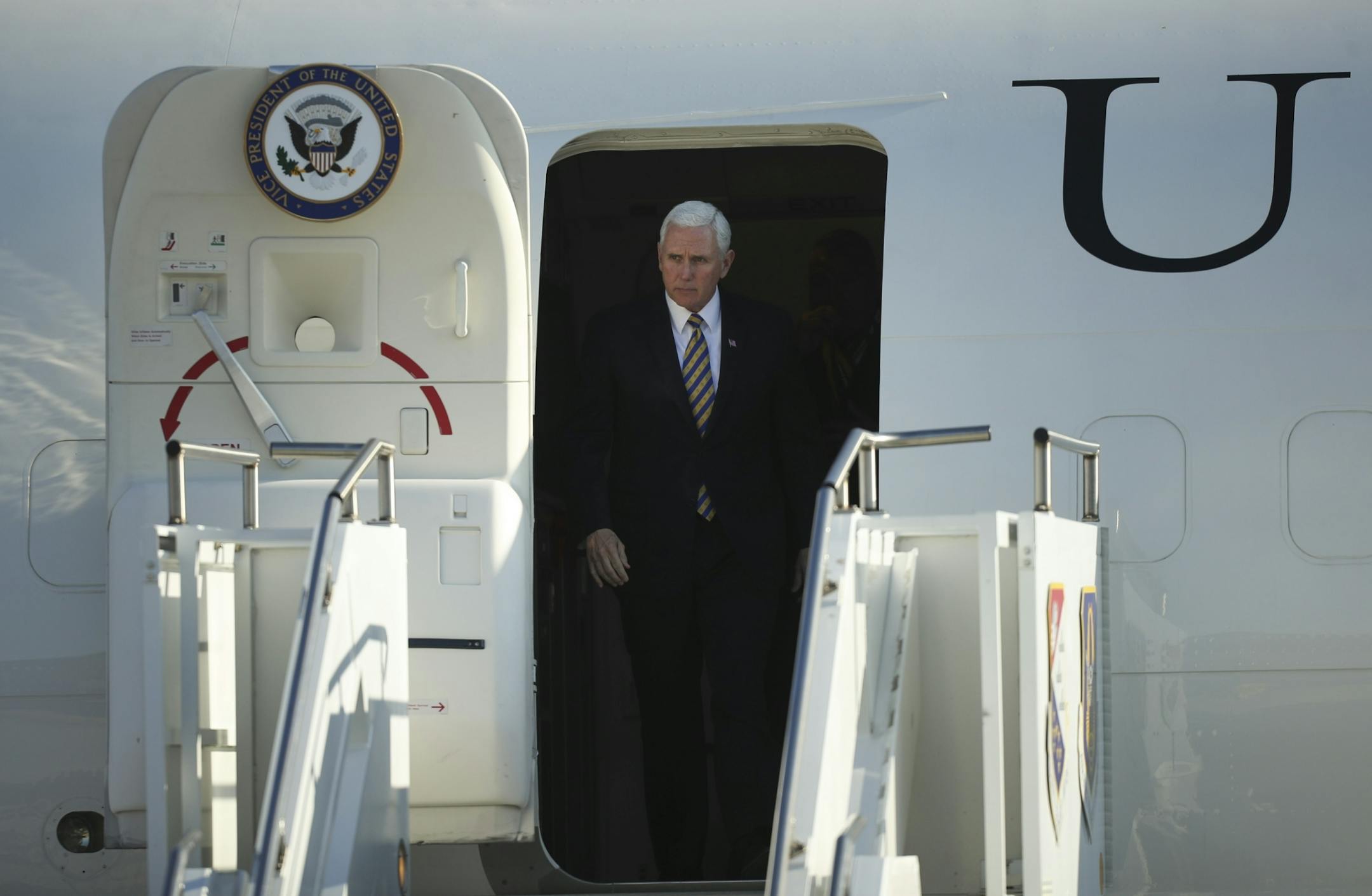 Vice President Mike Pence emerged from Air Force Two after arriving at the Minnesota National Guard - 934th Airlift Wing Tuesday afternoon.