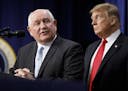Agriculture Secretary Sonny Perdue and President Donald Trump at the signing ceremony for the $867 billion farm bill in Washington, Dec. 20, 2018. The