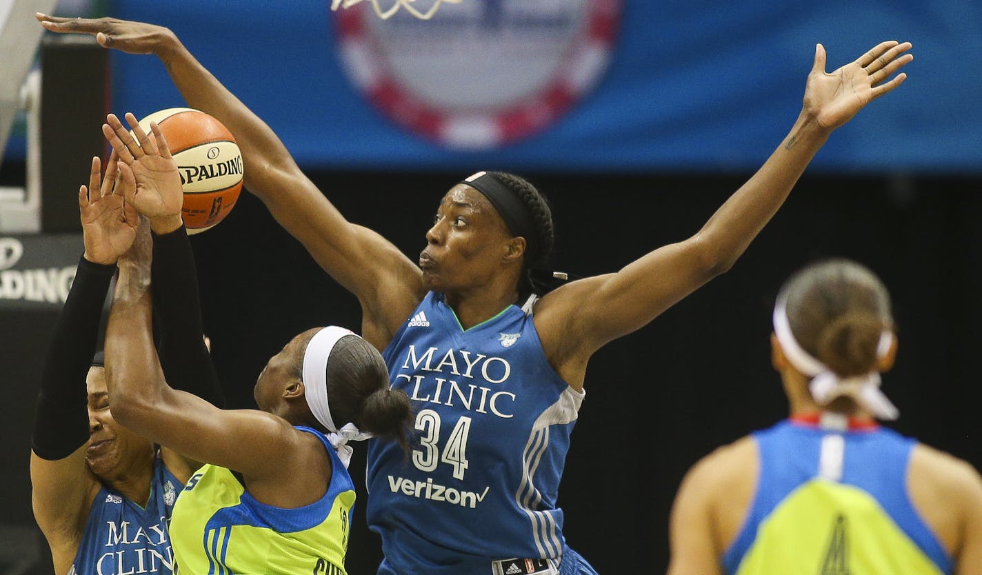 Minnesota Lynx center Sylvia Fowles (34) gets a piece of the ball as Dallas Wings forward Karima Christmas (13) drives to the basket. ] Timothy Nwachukwu &#x2022; timothy.nwachukwu@startribune.com The Minnesota Lynx play the Dallas Wings at the Target Center on Saturday, July 9, 2016. ORG XMIT: MIN1607092026303009