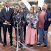 Surrounded by lawyers and family, Ricky Cobb’s twin brother Rashad Cobb, center, addresses the media about the lawsuit the family is filing against 