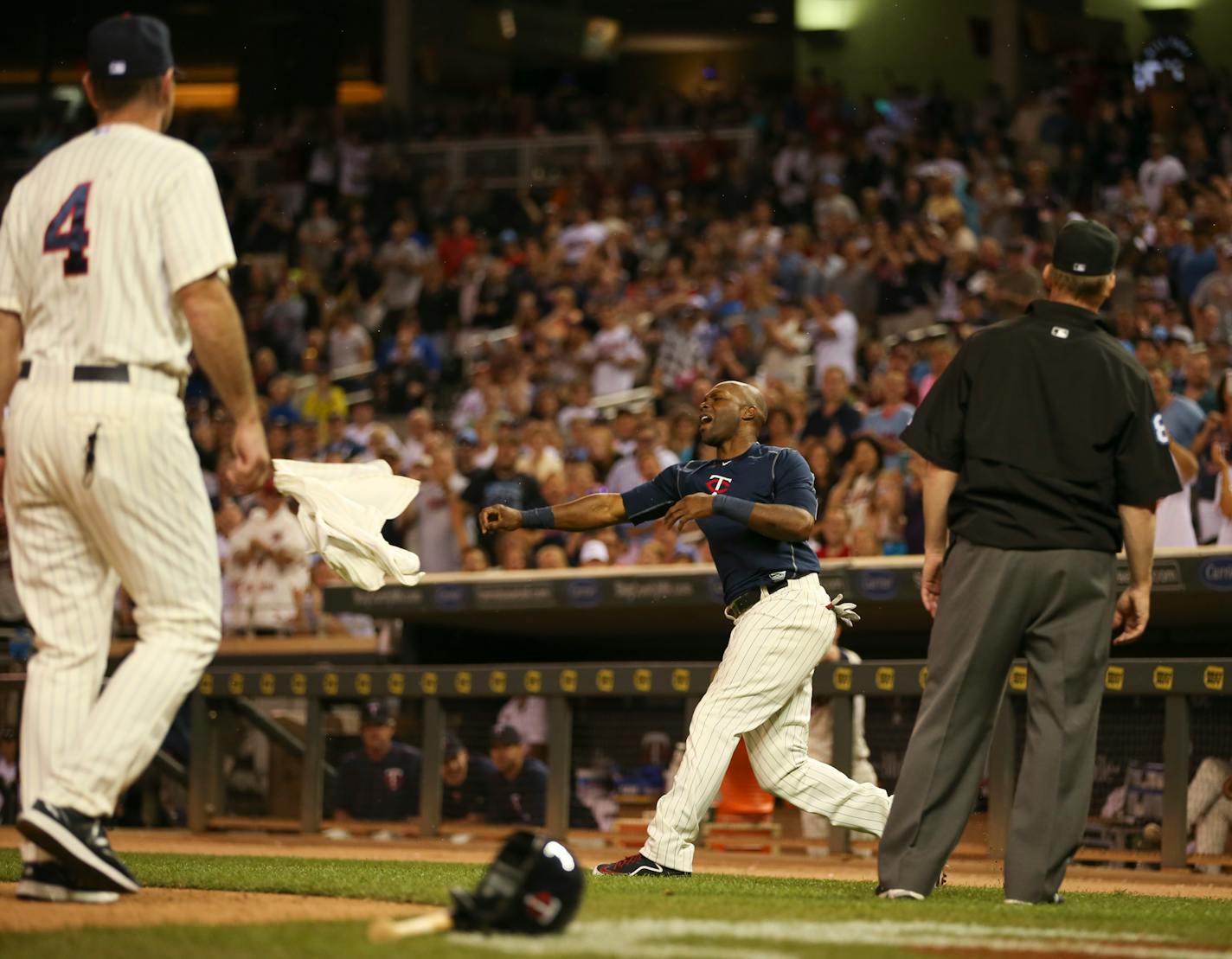 Torii Hunter took off his jersey and threw it onto the field after he was ejected in the eighth inning Wednesday night at Target Field.