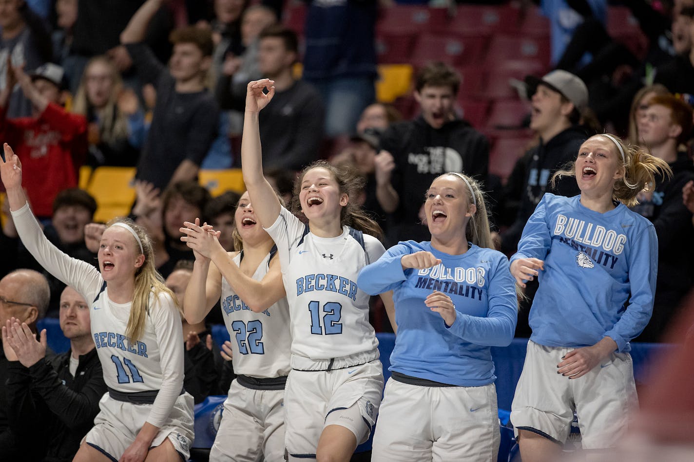 Becker's bench celebrated a three-point shot against Waconia during their match up in the Class 3A girls' basketball semifinals