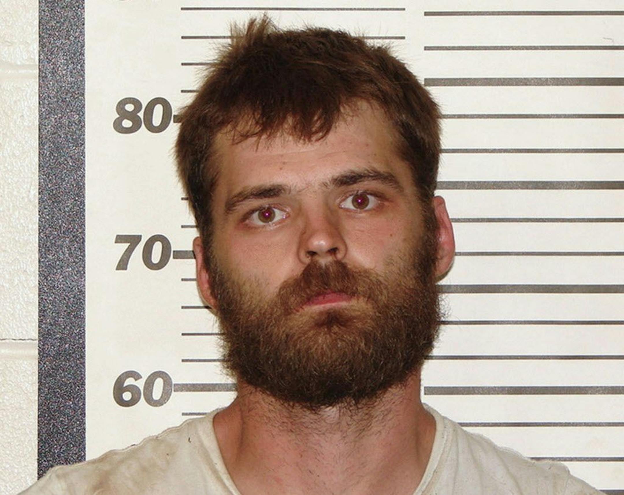 This Sept. 20, 2017, photo provided by the Ozark County Sheriff Office in Gainesville, Mo., shows Robert Peat Jr., who along with his wife, Rebecca Ruud, were indicted in the death of the Ruud's biological teenage daughter, who spent most of her life with an adoptive family in Minnesota.