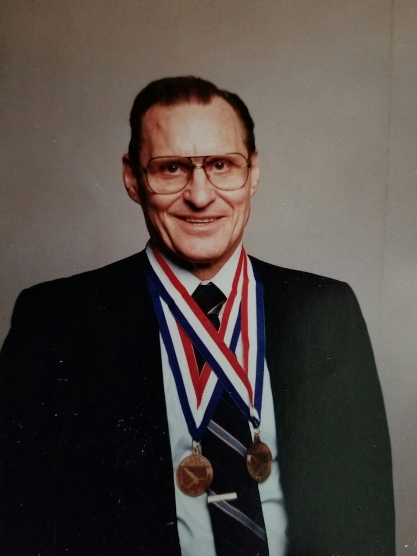 Gilbert LaLonde with some of his diving medals.