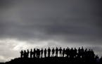 Golf fans wait for Northern Ireland's Rory McIlroy during round one of the Irish Open Golf Championship at Royal County Down, Newcastle, Northern Irel