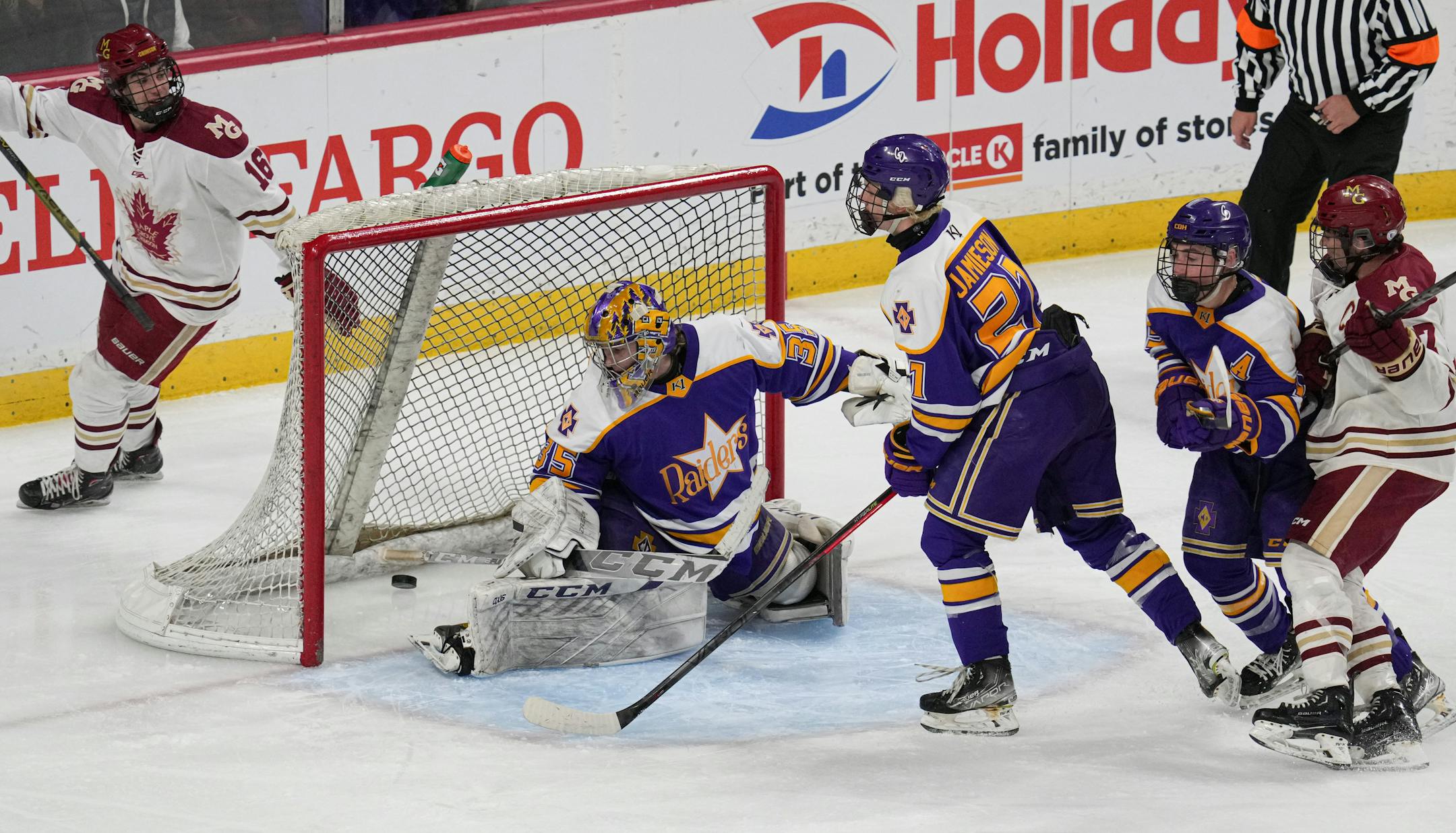 Maple Grove forward Jay Ellingson, left, scored the first Maple Grove goal against Cretin-Durham Hall in the first period.