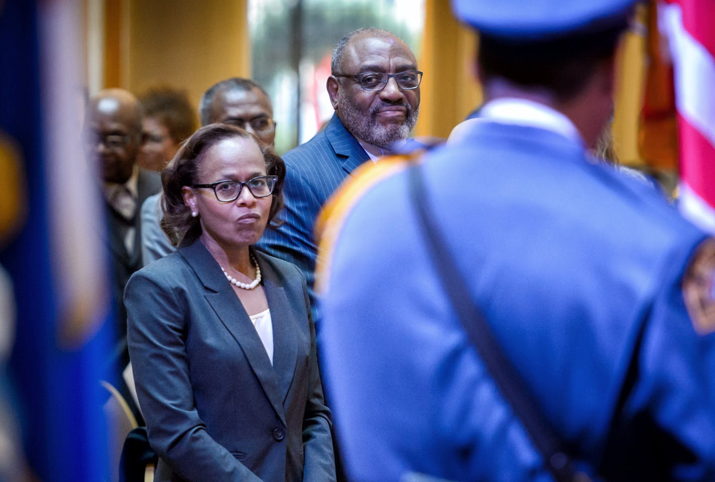 Judge Natalie Hudson and her husband Rev. Willie Hudson stood for the color guard at her swearing in ceremony. ] GLEN STUBBE * gstubbe@startribune.com Friday, November 20, 2015 Judge Natalie Hudson was sworn in Friday, becoming the second African-American woman on the Minnesota Supreme Court.