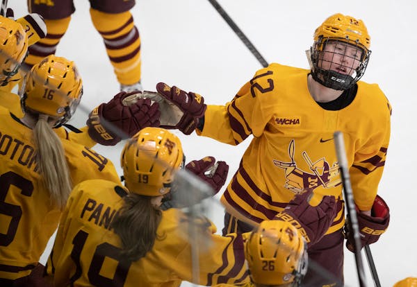 Grace Zumwinkle, above celebrating one of her 102 goals in her Gophers career, got latest two on Friday against St. Thomas.