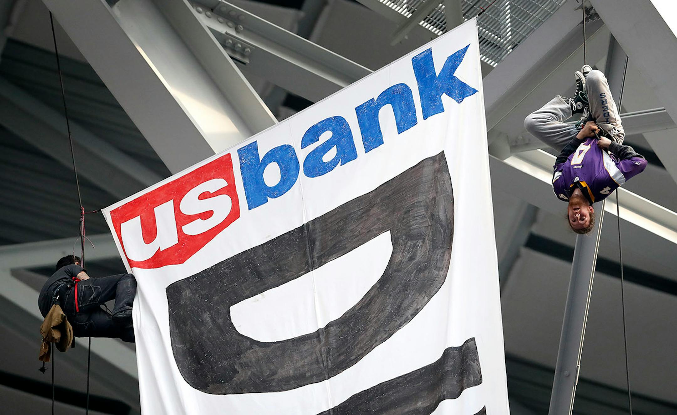 #NoDAPL protesters hung a sign from the rafters of US Bank Stadium during the Minnesota Vikings vs. Chicago Bears Game.
