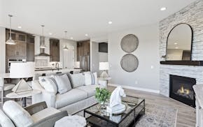 A model home in Bellwether, a 55-plus active adult community in Corcoran featuring indoor and outdoor pools, a clubhouse, and pickleball and bocce bal