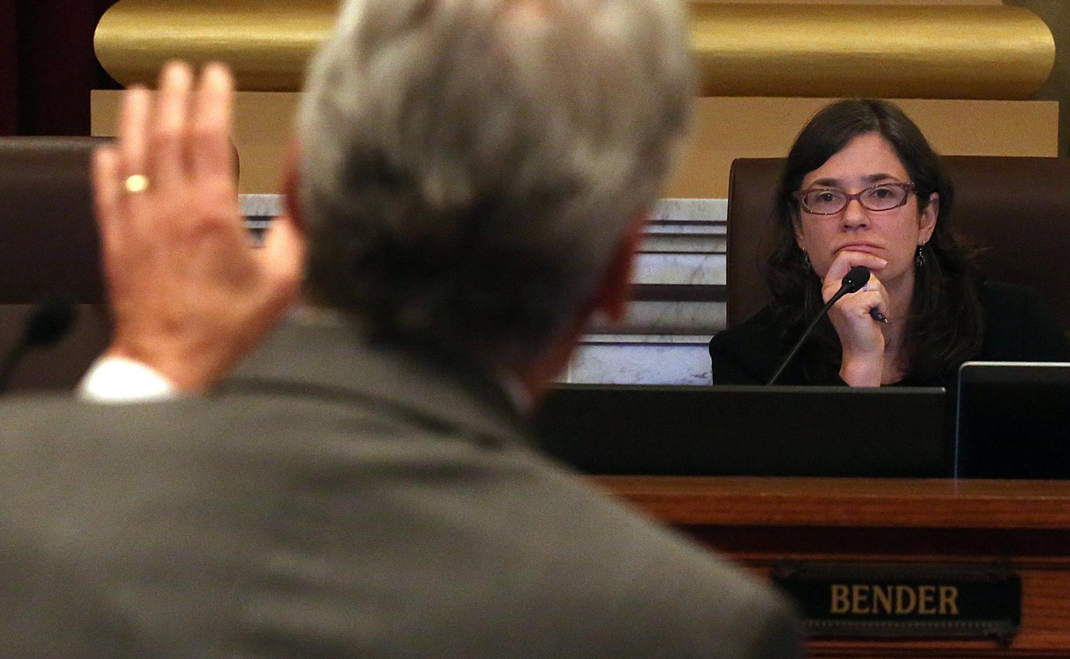 Attorney Tom Johnson spoke on behalf of residents who would be impacted by a proposed hotel, at a public hearing of the Zoning and Planning Committee at the Minneapolis City Council Chambers regarding appeals to a conditional use permit and variances a new hotel planned for the Uptown neighborhood. Committee chair Lisa Bender is at right. ] JIM GEHRZ ï james.gehrz@startribune.com /Minneapolis, MN / March 3, 2016 /9:30 AM ñ BACKGROUND INFORMATION: A proposal to build a hotel in Uptown i