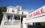 FILE - A for sale sign stands in front of a house, on Oct. 6, 2020, in Westwood, Mass. Average long-term U.S. mortgage rates jumped back up ahead of n