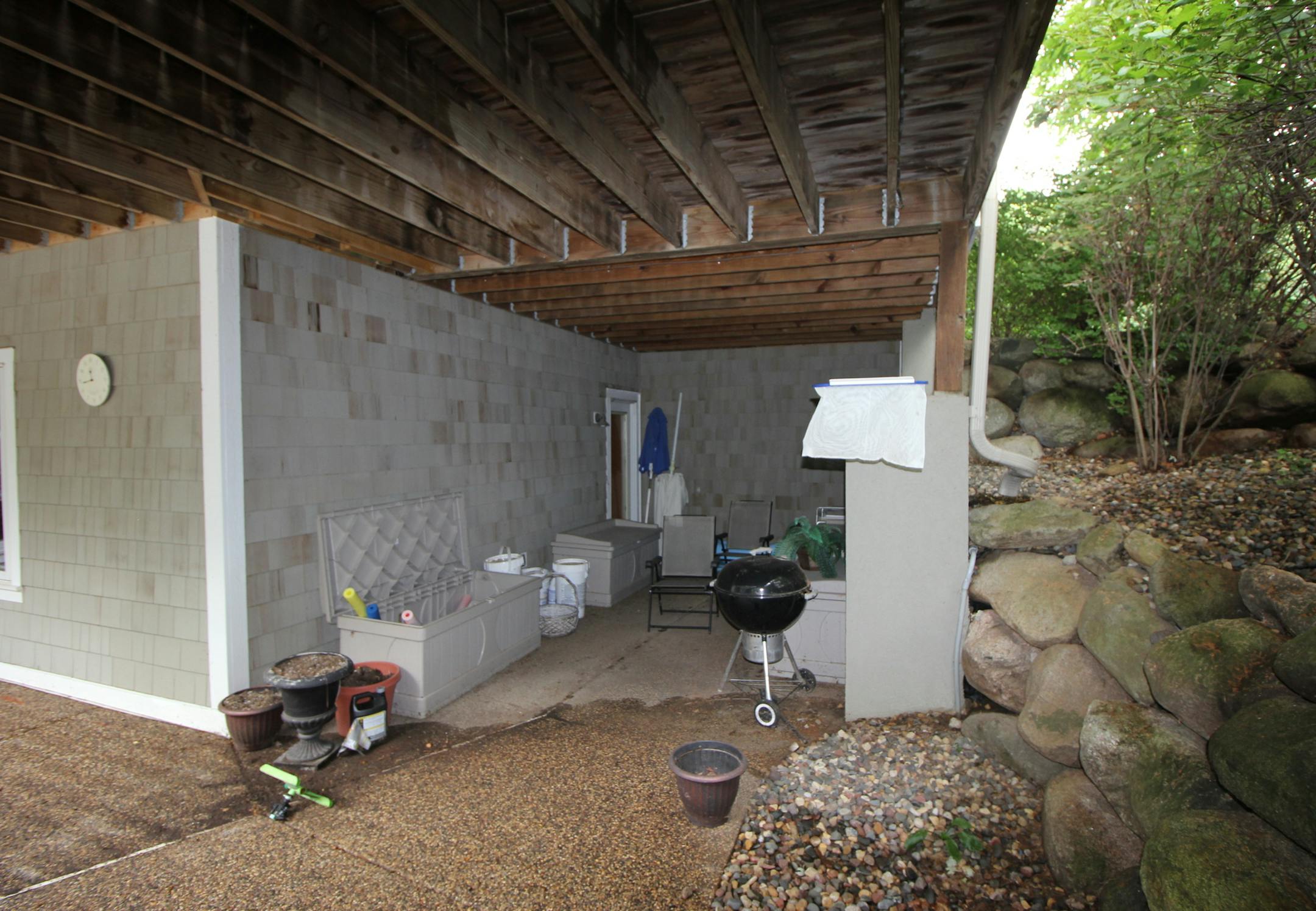 BEFORE: Area under porch