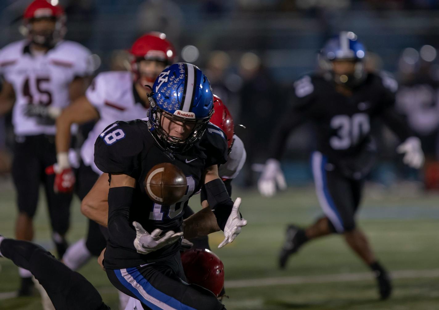 Minnetonka free safety Luke Tollefson (#18) makes a maintains focus and comes down with the ball. ] Special to Star Tribune, photo by Matt Blewett, Matte B Photography, matt@mattebphoto.com, High School Football, Lake Conference, Eden Prairie, Minnetonka, October 12, 2018, Minnetonka, MN, SAXO 1007299744 PREP.tonka