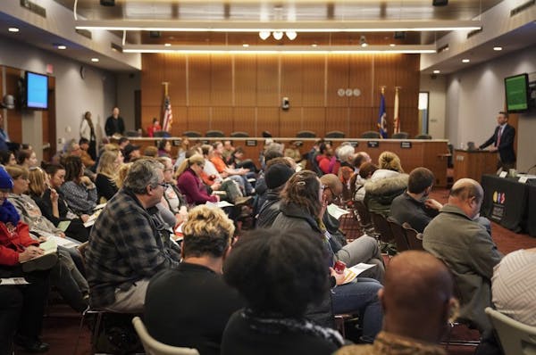 A packed room during a listening session on the Minneapolis school's massive restructuring plan at the district herald quarters in Minneapolis, Minn.,