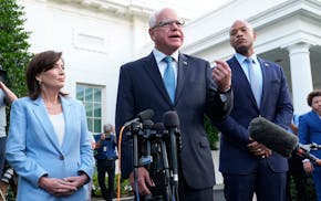 Minnesota Gov. Tim Walz speaks to reporters after meeting with President Joe Biden last week at the White House, as New York Gov. Kathy Hochul and Mar