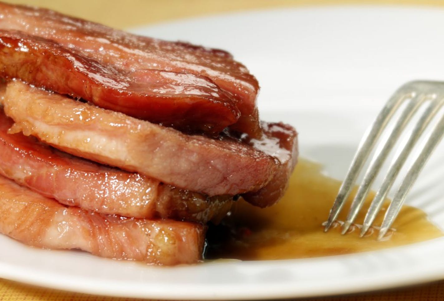 Brown sugar forms a nice glaze over slow-cooked ham.