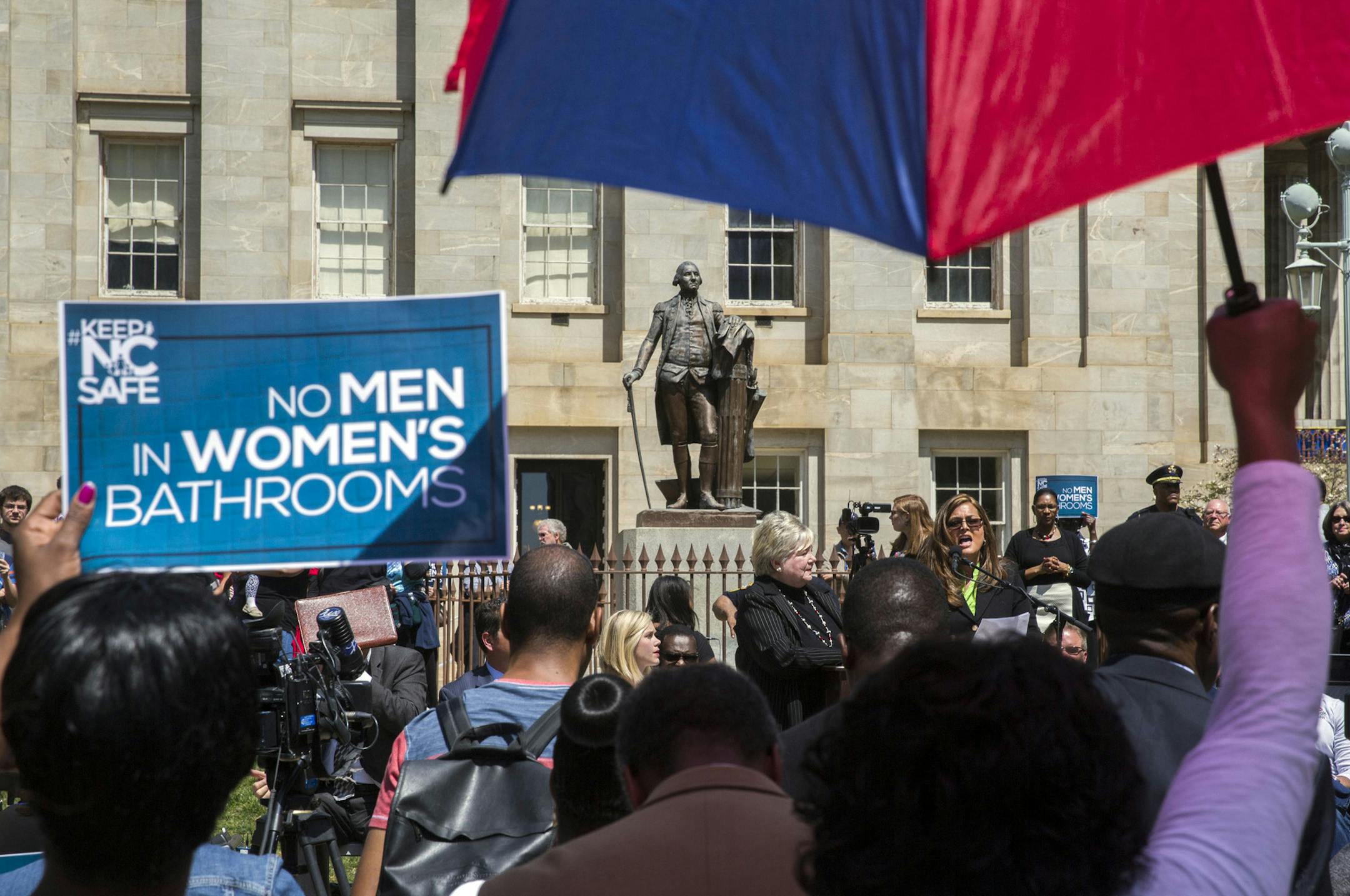 FILE — Supporters of a state bill restricting transgender individual’s bathroom access rally outside the state capitol in Raleigh, N.C., April 11, 2016. The legal battle between North Carolina and the Justice Department will hinge on interpretations of the federal Civil Rights Act of 1964, which itself only came to reference gender in almost accidental fashion. (Ray Whitehouse/The New York Times)