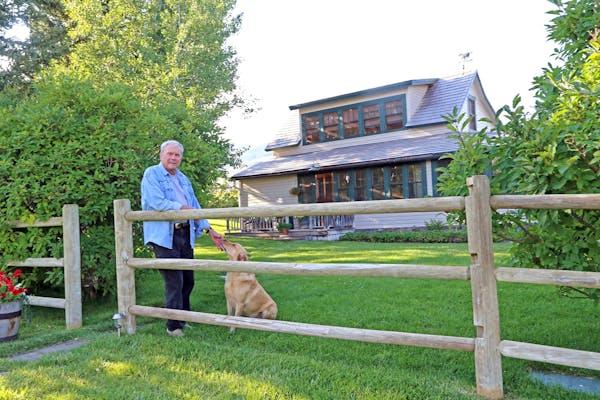 Retired NBC News anchor Tom Brokaw with his Labrador, Red, on Brokaw's Montana ranch. Brokaw, an avid bird hunter and South Dakota native, spends summ