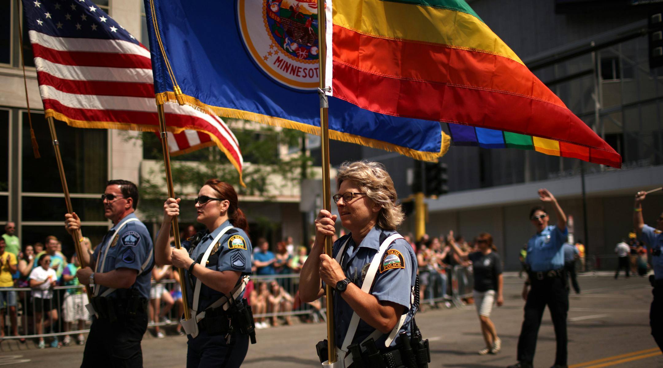 Officers from Minneapolis and St. Paul police departments led the parade down Hennepin Ave. Sunday morning. ] JEFF WHEELER ï jeff.wheeler@startribune.com The 2015 Ashley Rukes GLBT Pride Parade was held along Hennepin Ave. Sunday, June 28, 2015 in Minneapolis. ORG XMIT: MIN1506281137170142