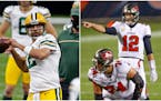 Aaron Rodgers of the Packers (left) and Tom Brady of Tampa Bay have split the first two meetings of their NFL careers. The third one is Sunday.