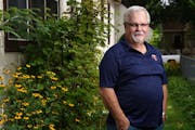 Jim Miller, who spent 35 years as a U.S. Postal Service employee working a variety of jobs from letter carrier to supervisor, stood for a portrait Fri