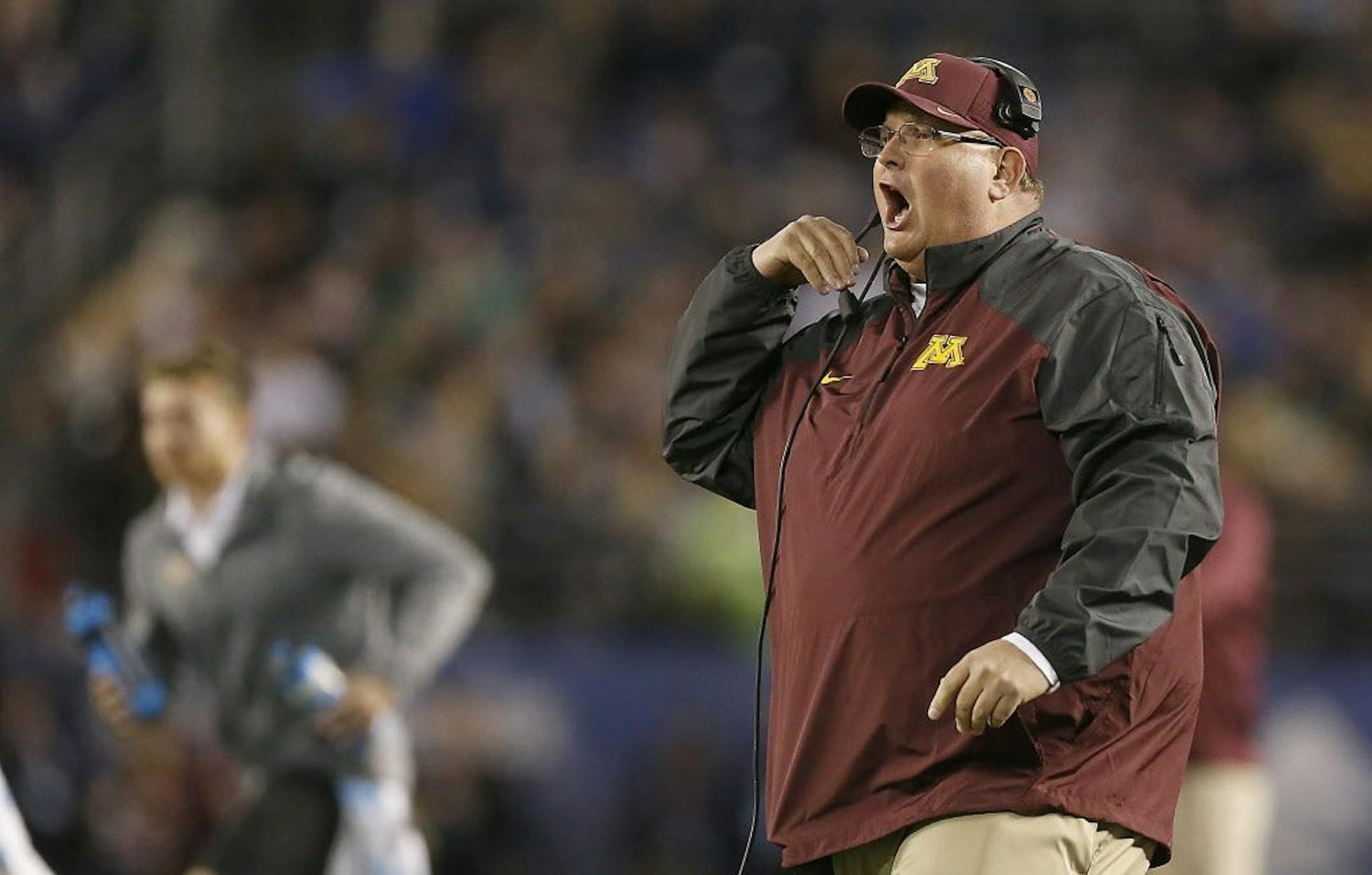 Minnesota head coach Tracy Claeys disputes a call during the second quarter against Washington State during the Holiday Bowl at Qualcomm Stadium in San Diego on Tuesday, Dec. 27, 2016. Minnesota won, 17-12.