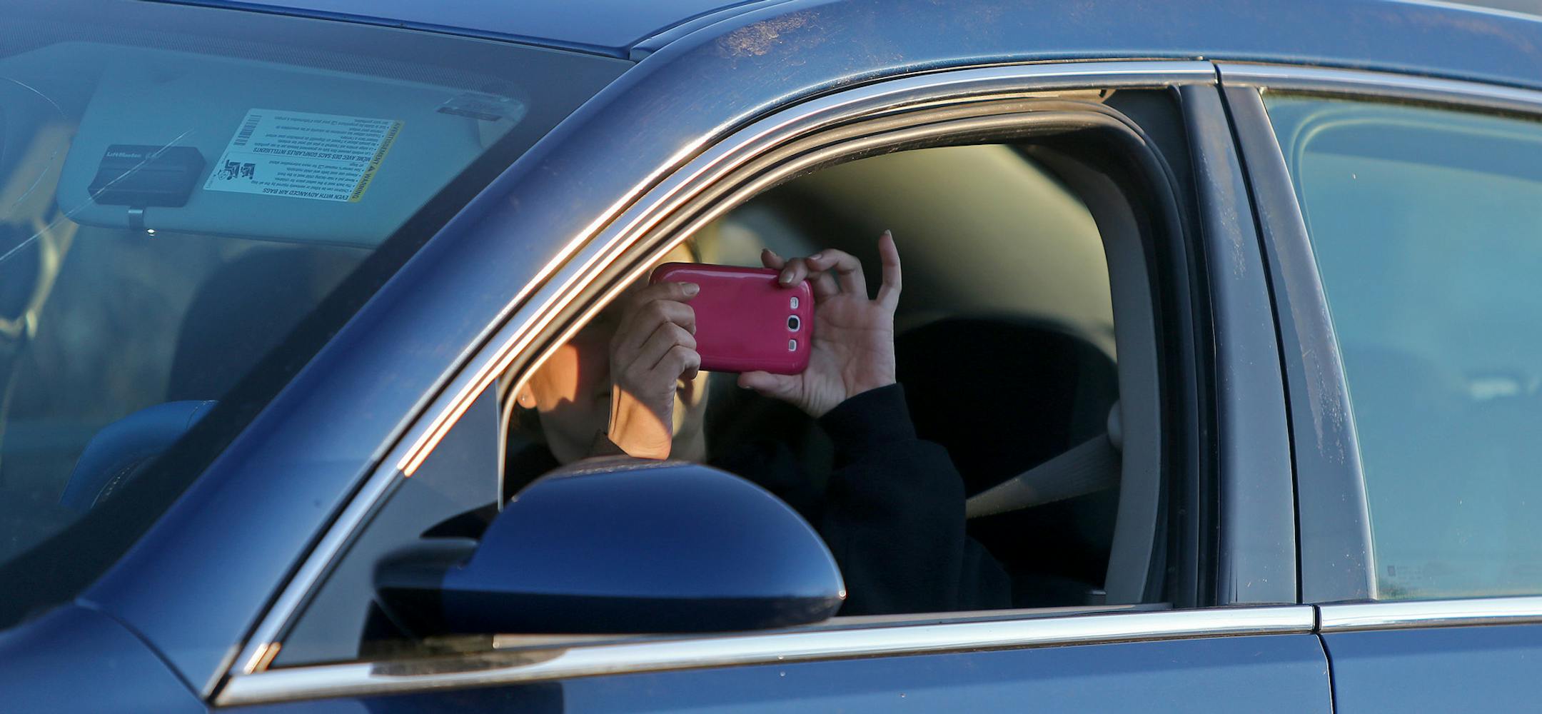 People in their cars were able to drive-by and snap photos and watch Knollwood Christian Church's re-enactment of Jesus' life and death Thursday, April 17, 2014. "It's an honor," he said. ] (ELIZABETH FLORES/STAR TRIBUNE) ELIZABETH FLORES • eflores@startribune.com