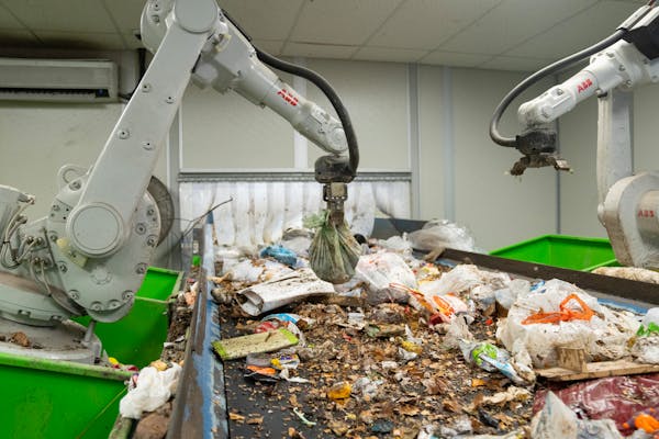 Robotic arms used artificial intelligence to sort green food scrap bags from incoming waste Thursday at the Ramsey/Washington Recycling &amp; Energy C