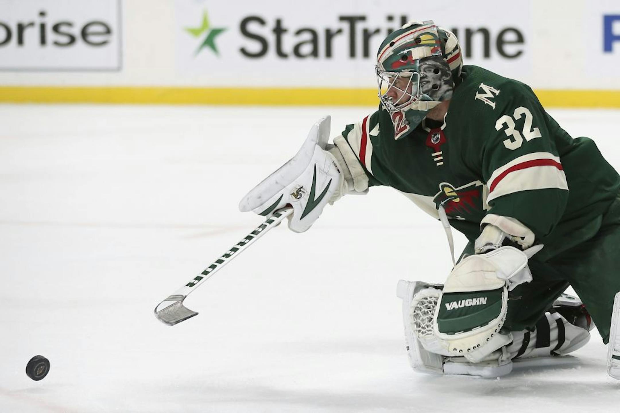 Minnesota Wild's goalie Alex Stalock blocks a shot attempt by the Philadelphia Flyers in the second period of an NHL hockey game Saturday Dec. 14, 2019, in St. Paul, Minn.