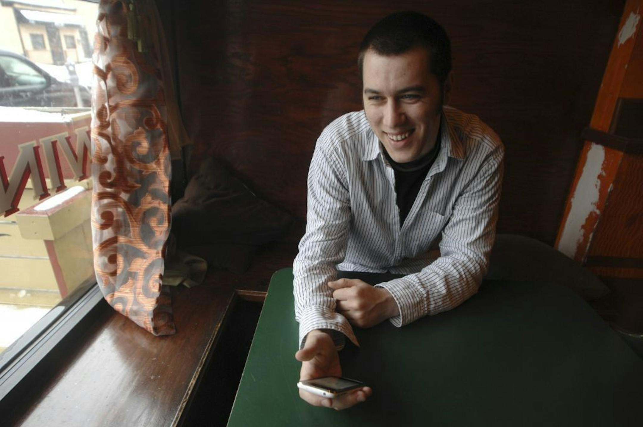 Nate Fanaro wrote a program that detects tweets written in capital letters called "CapsCop," photographed in Buffalo, N.Y., on Feb. 27, 2010. Fanaro is part of a small but vocal group of self-appointed scolders who are policing tweets for grammar and content.