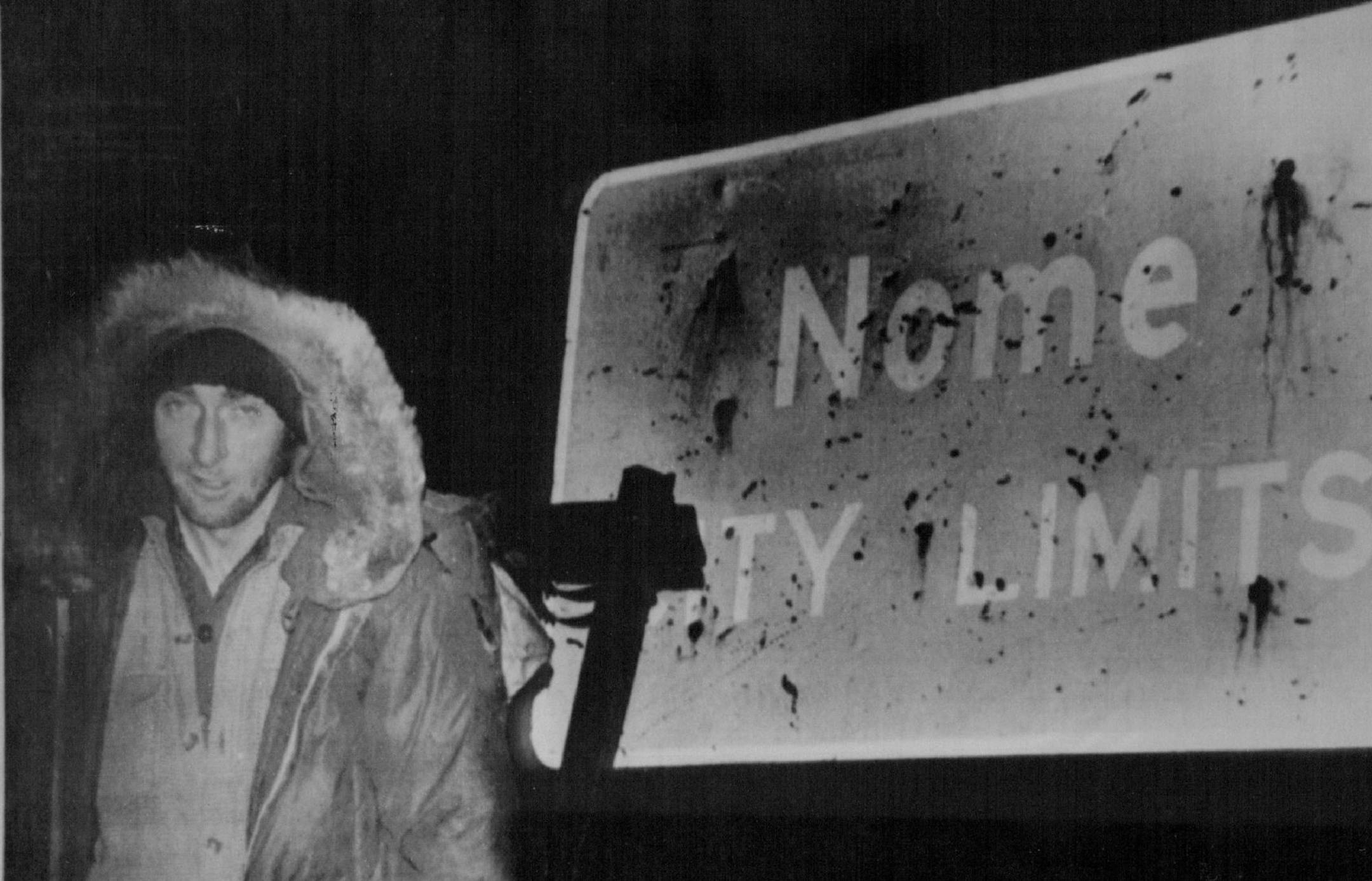 November 15, 1977 Jerry Pushcar, 27, of Biwabik, Minn., pauses by the sign that marked the end of a three-year canoe trek and hike from New Orleans. Pushcar arrived in this Norton Sound community on Saturday, after an 8,500-mile journey. He left Louisianna in January 1975, heading up the Mississippi river by canoe. November 16, 1977 Heinrich, AP Wirephoto