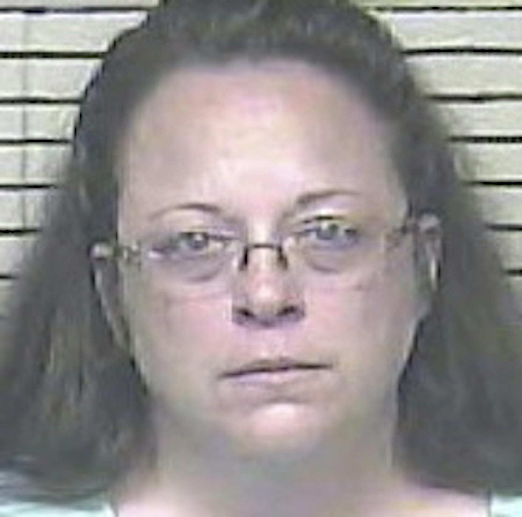 In a booking photo, Kim Davis, the elected clerk of Rowan County, is jailed at the Carter County Detention Center in Grayson, Ky., Sept. 3, 2015. The arrest of Davis for her refusal to issue licenses to gay and lesbian couples has stoked the anger of religious conservatives and exposed divisions within the Republican Party. (Carter County Detention Center via The New York Times) -- FOR EDITORIAL USE ONLY --