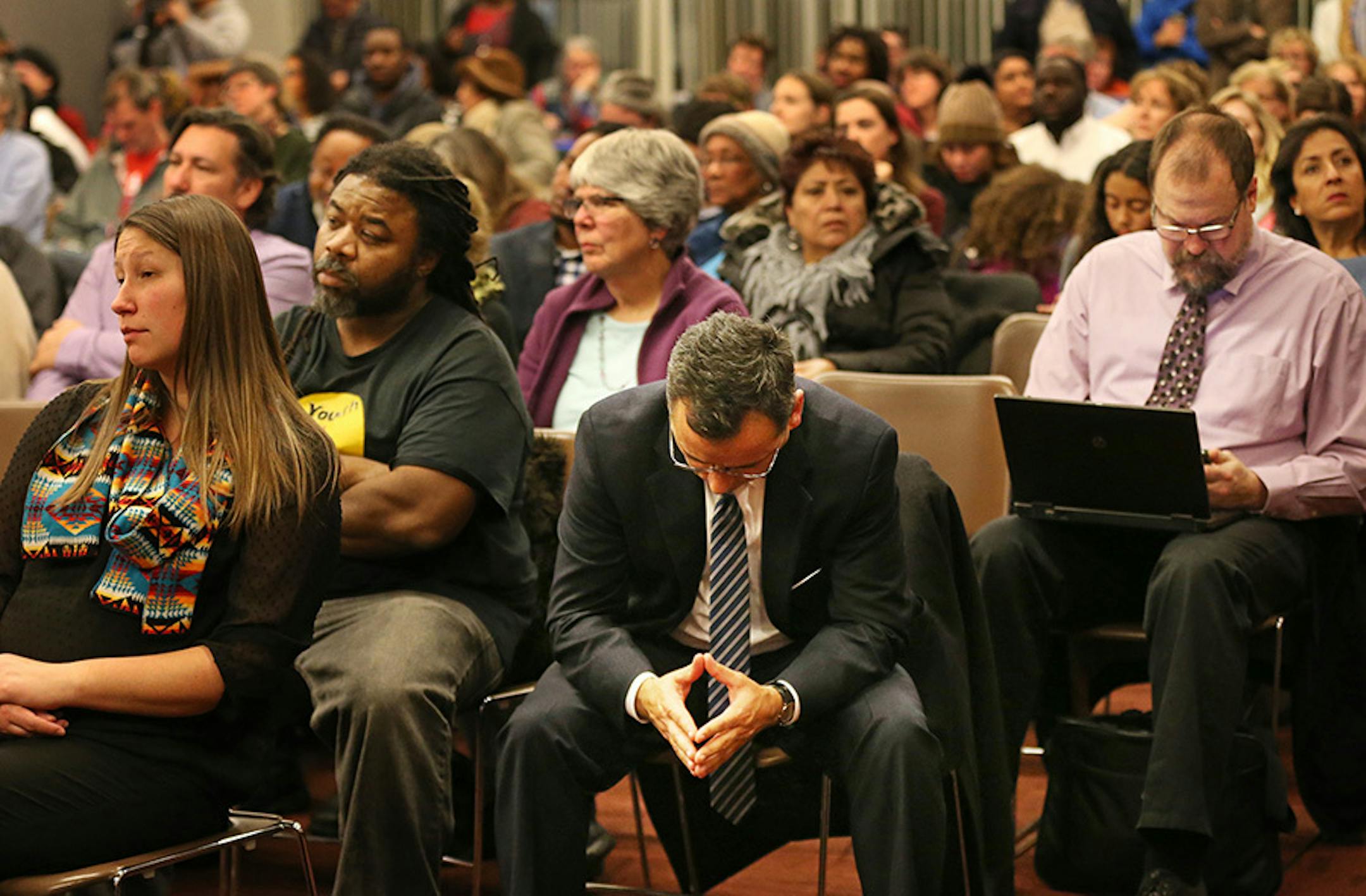 Sergio Paez dropped his head after the Minneapolis school board members voted to terminate contract talks with him to be the next Minneapolis Public Schools superintendent.
