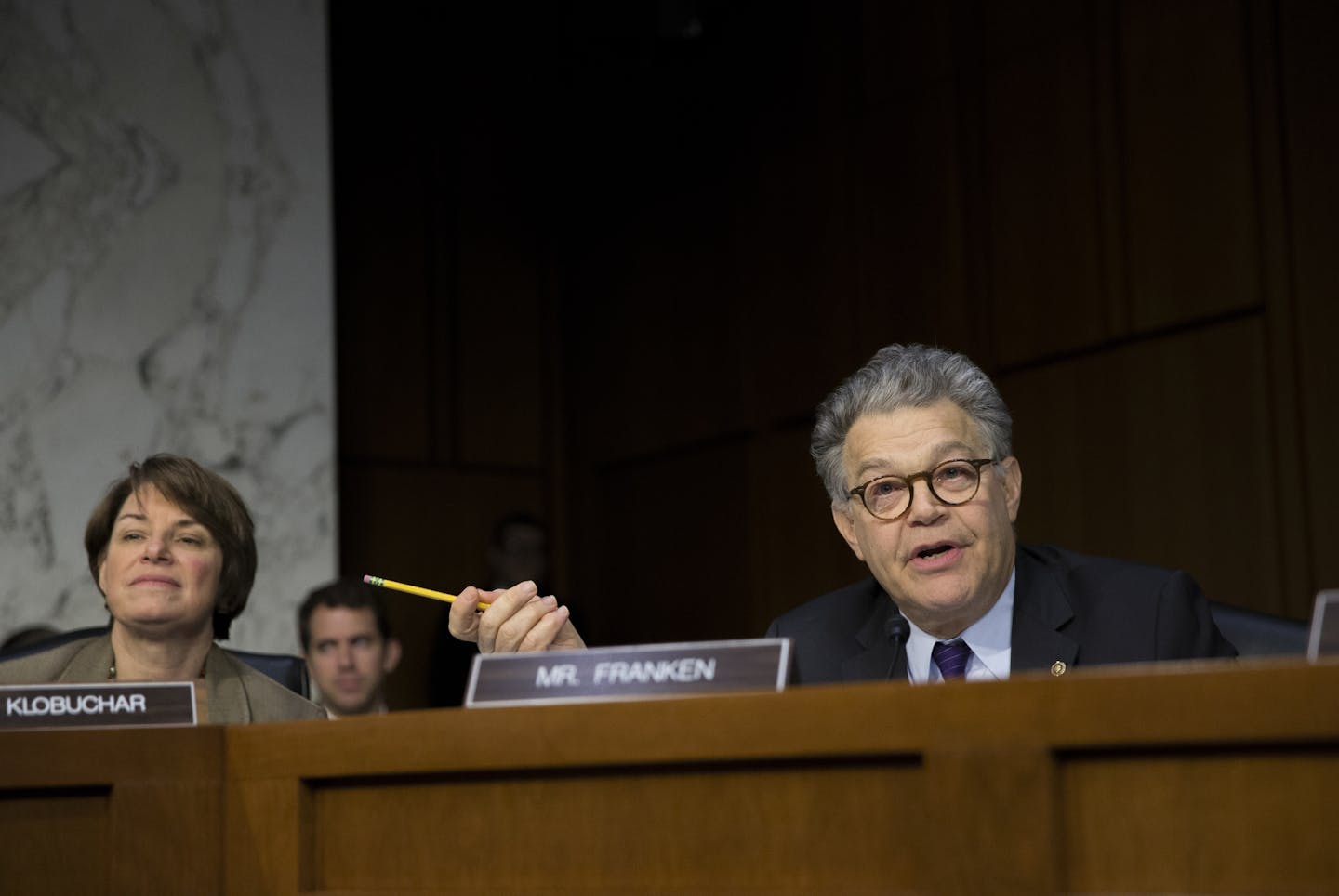 Sen. Al Franken (D-Minn.) questions Attorney General Jeff Sessions during a Senate Judiciary Committee hearing on Capitol Hill, in Washington, Oct. 18, 2017. Sessions told lawmakers he would not discuss his conversations with President Donald Trump, citing executive privilege, a tack he has taken before and one that angered Democrats, as Trump has not invoked the privilege. At left is Sen. Amy Klobuchar (D-Minn.). (Tom Brenner/The New York Times)