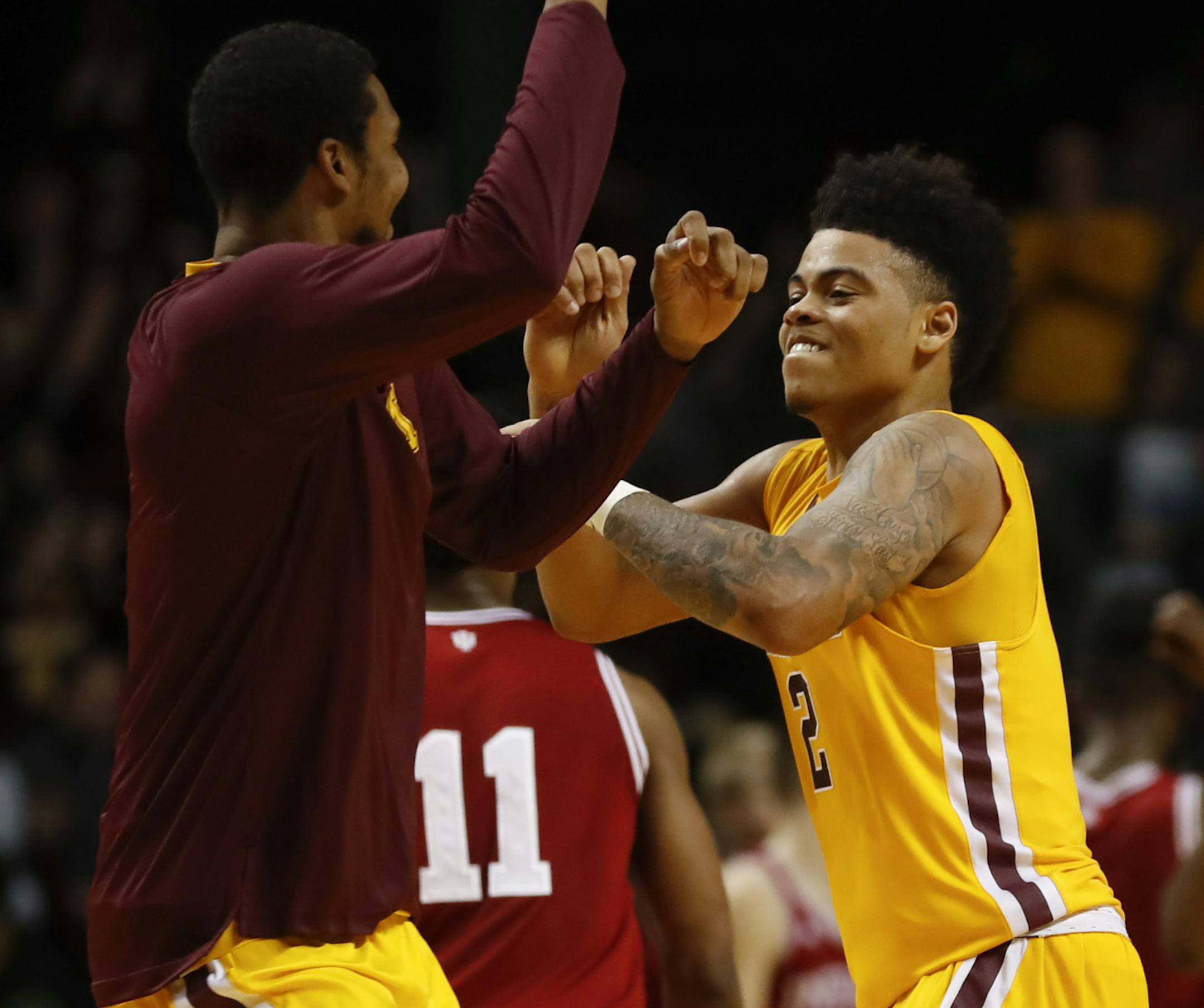 Gophers guard Nate Mason (2) and a teammate celebrated the Gophers' 75-74 win over Indiana. ] JEFF WHEELER ï jeff.wheeler@startribune.com The University of Minnesota men's basketball team eked out a 75-74 win over Indiana University in a Big 10 Conference basketball game Wednesday night, February 15, 2017 at Williams Arena in Minneapolis.