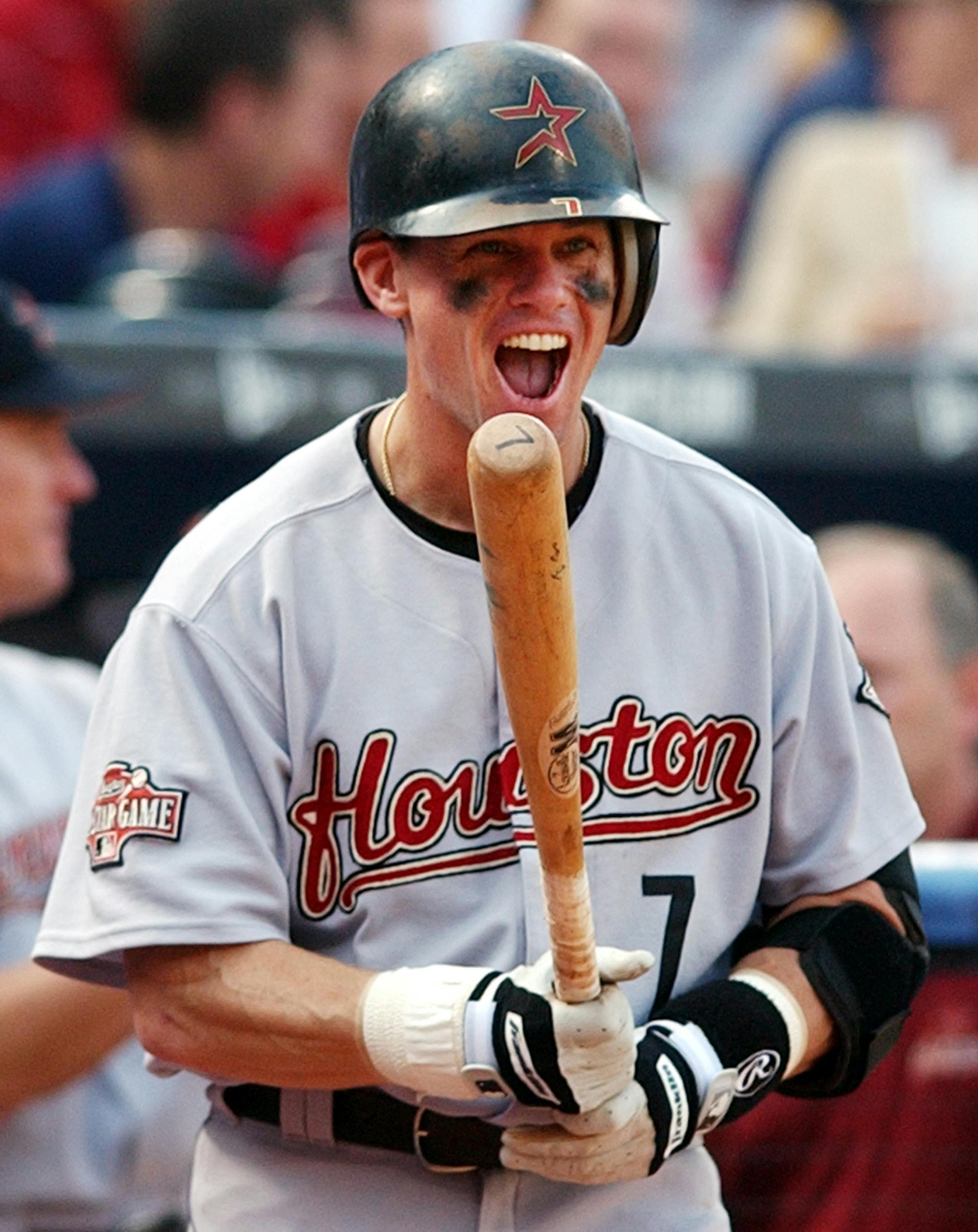 Houston Astros' Craig Biggio reacts to teammate Brad Ausmus's home run in the third inning against the Atlanta Braves during Game 1 of the National League Division Series at Turner Field in Atlanta, Wednesday Oct. 6, 2004. (AP Photo/John Bazemore) ORG XMIT: ATF106
