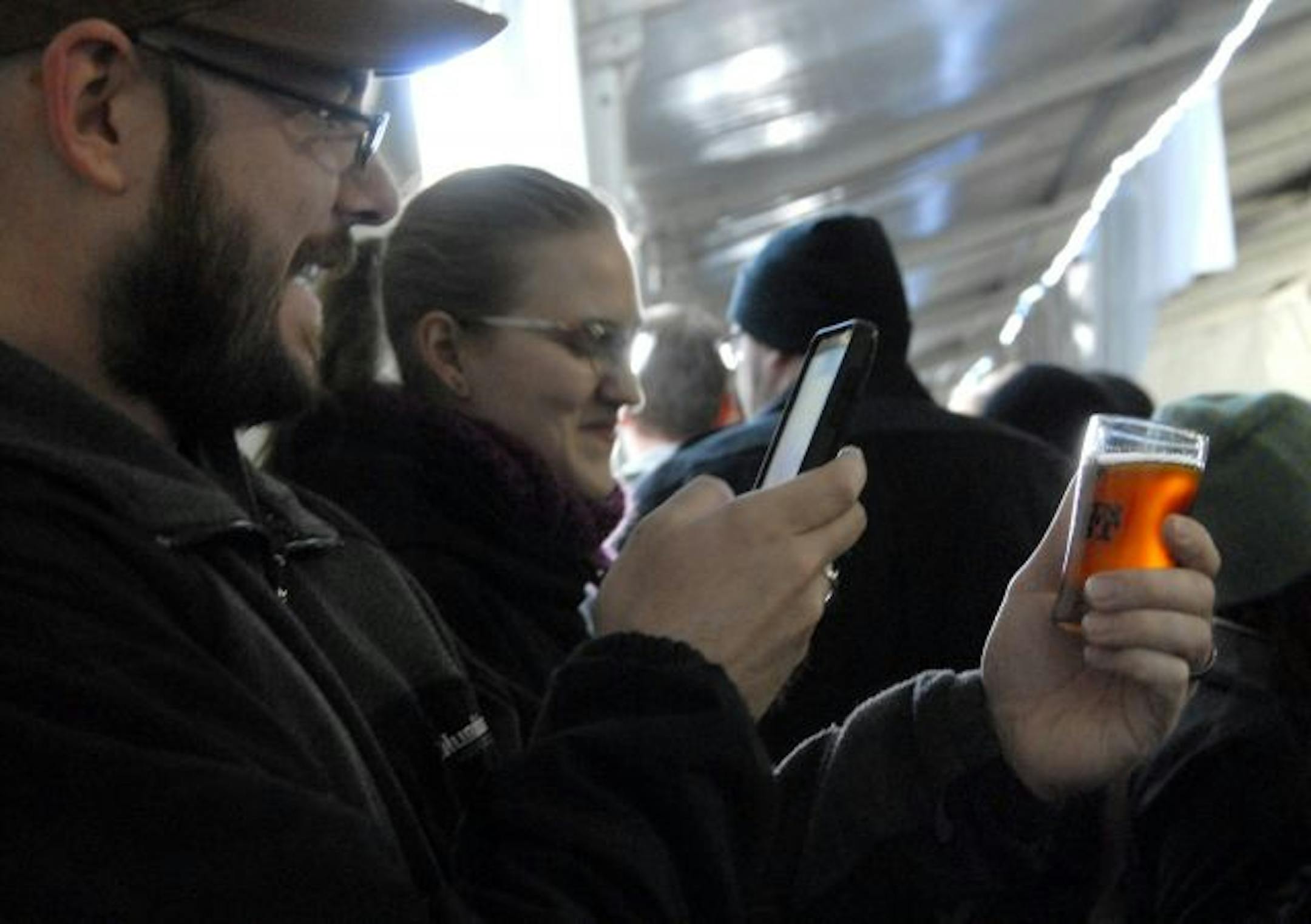 Joey McLeister • Special to the Star Tribune
Eric Ronning took a photo of his glass of Dark Horse Double Crooked Tree IPA and said, "It's fantastic. It's beautiful," at the Happy Gnome's 4th Annual Firkin Fest.