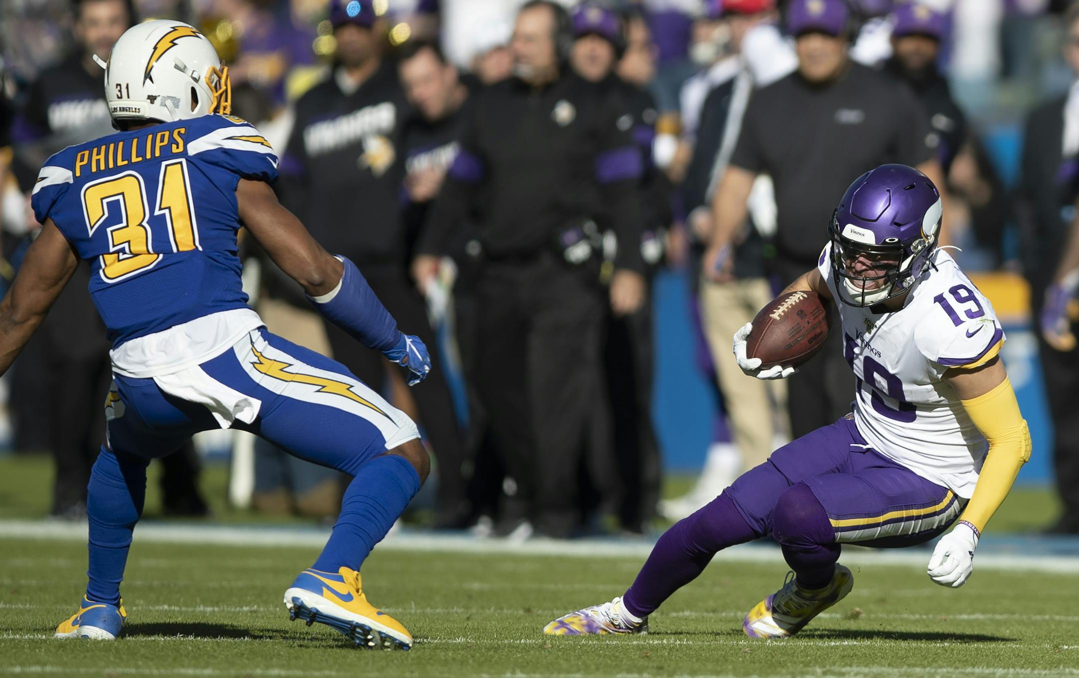 Minnesota Vikings wide receiver Adam Thielen (19) pulled down a first quarter catch over Los Angeles Chargers defensive back Adrian Phillips (31) .] Jerry Holt &#x2022; Jerry.Holt@startribune.com The Minnesota Vikings played the Los Angeles Chargers in an NFL football game Sunday , December 15, 2019 at Dignity Health Sports Park in Carson, CA.